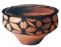 Painted basin with design of flower petals