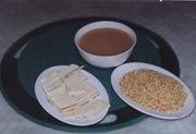 Stir-fried rice, tea with milk, milk bean-curd
